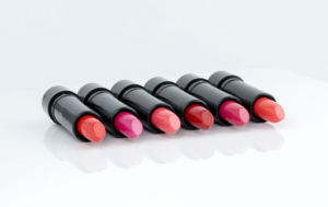 different shaded lipsticks lined up in a row
